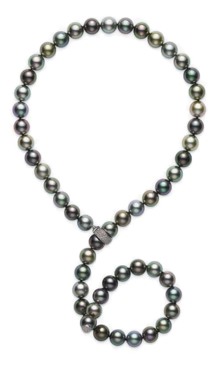 Mikimoto Lariat fine jewellery pearl necklace featuring multi-coloured black South Sea pearls with a diamond clasp set in white gold.
